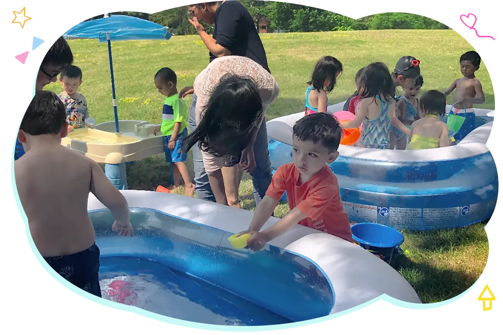 Children learning together outdoors during the summer